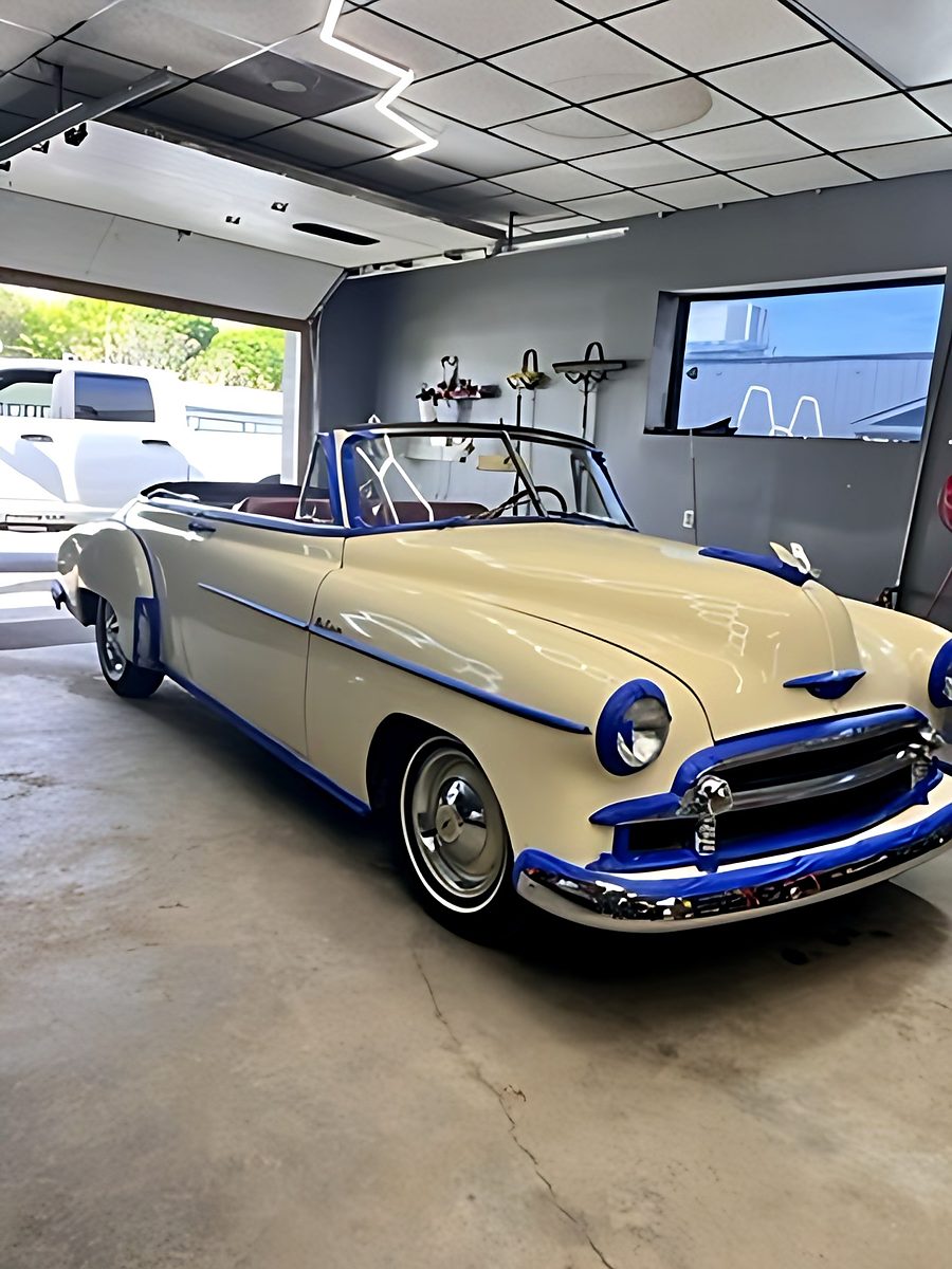 Cream convertible in the shop