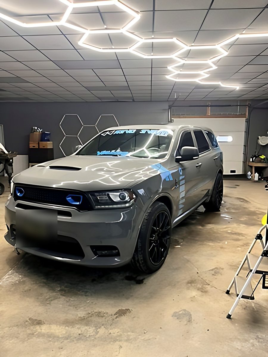 Grey Dodge Durango in the detailing bay
