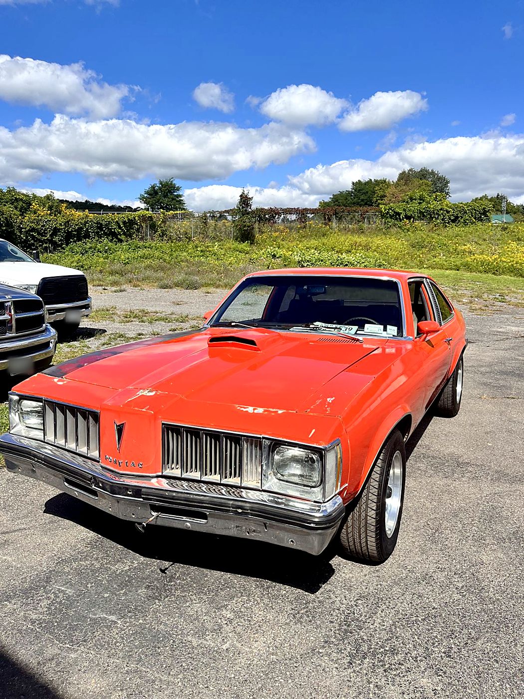 Orange Oldsmobile Cutlass